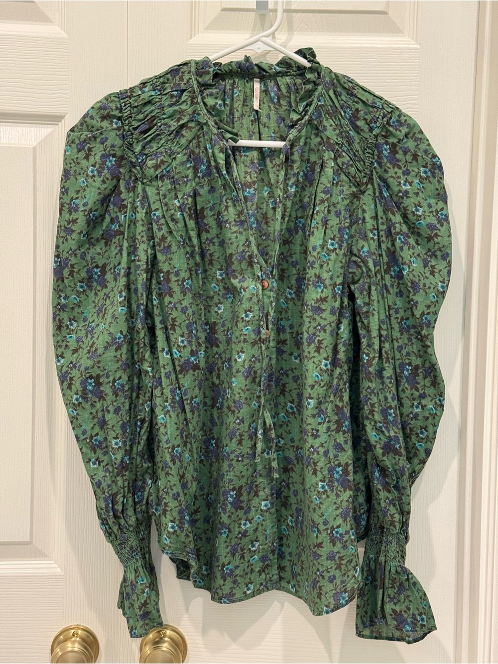 Free People “Meant to Be” floral blouse